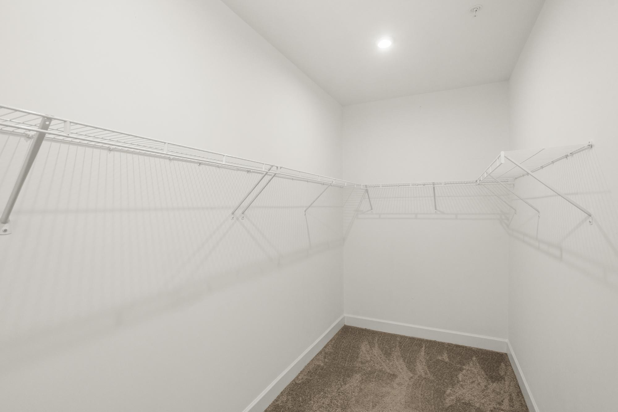 141 Saundersville Road, Unit 1402 Hendersonville, TN 37075 - Photo 17 of 60 a view of a room with racks on the wall