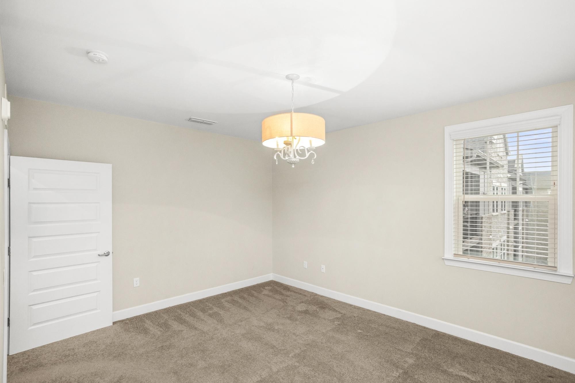 141 Saundersville Road, Unit 1402 Hendersonville, TN 37075 - Photo 31 of 60 an empty room with a window