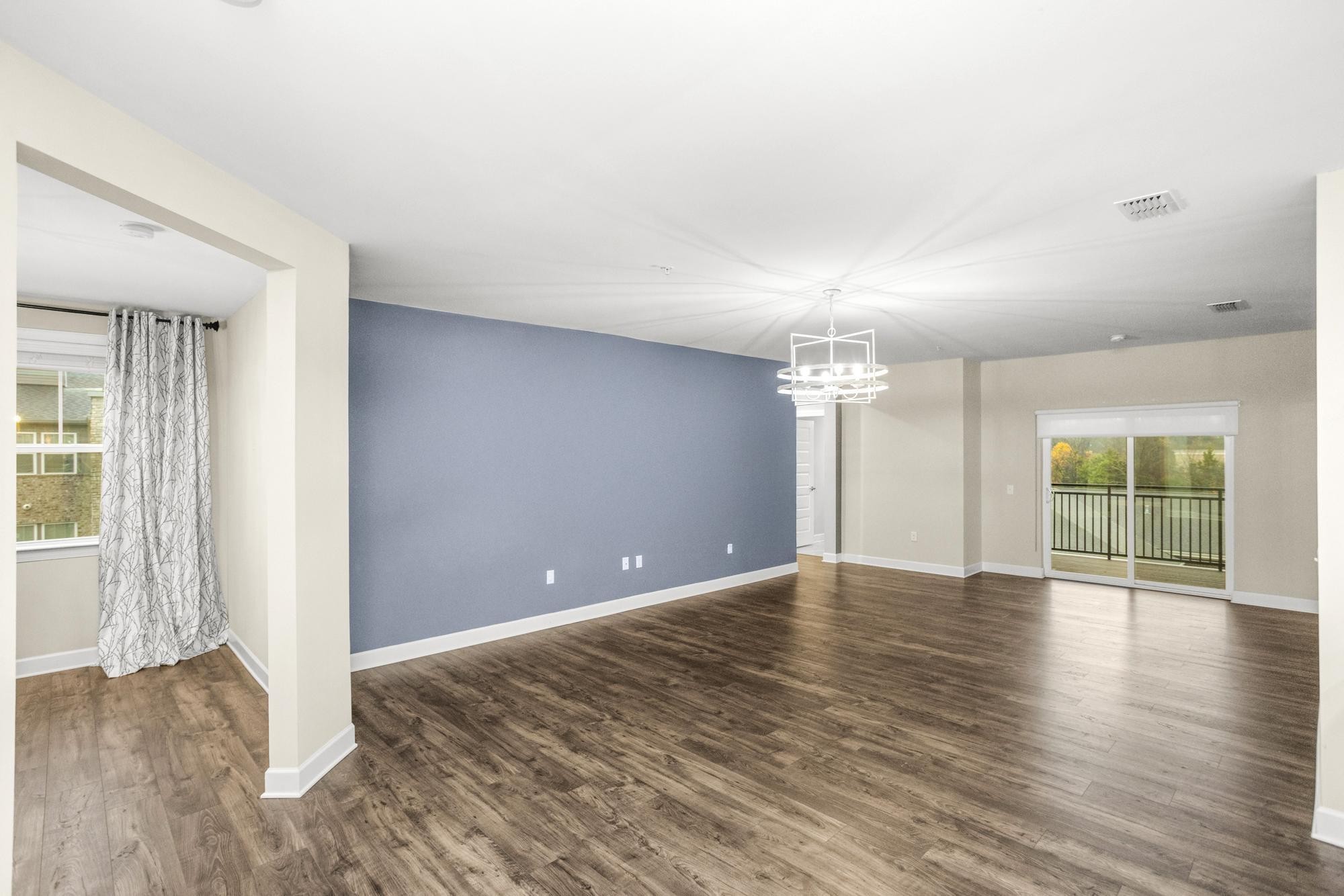 141 Saundersville Road, Unit 1402 Hendersonville, TN 37075 - Photo 37 of 60 wooden floor in an empty room with a window