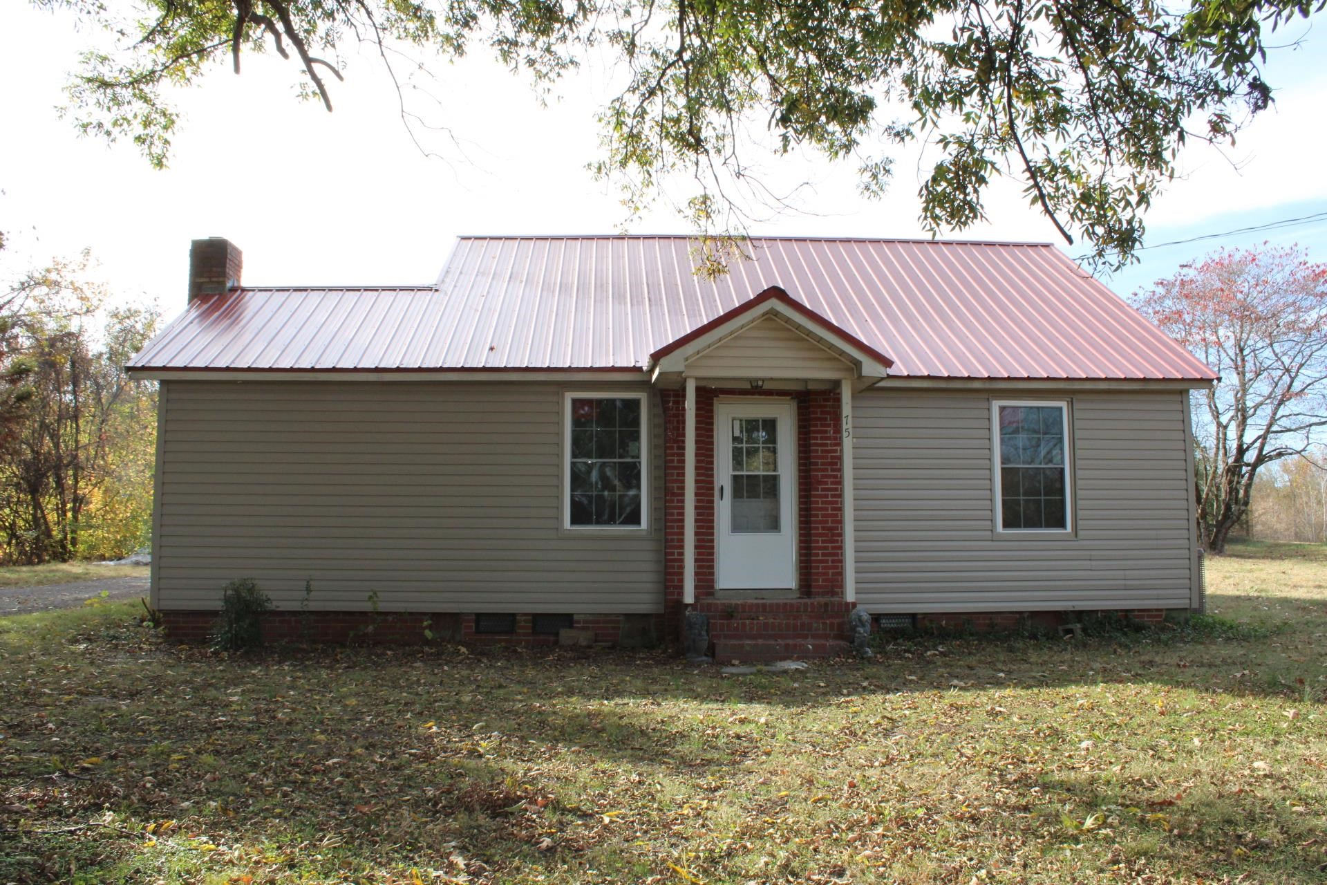 75 Curve Nankipoo Road Ripley, TN 38063 - Photo 1 of 22 a front view of a house with garden