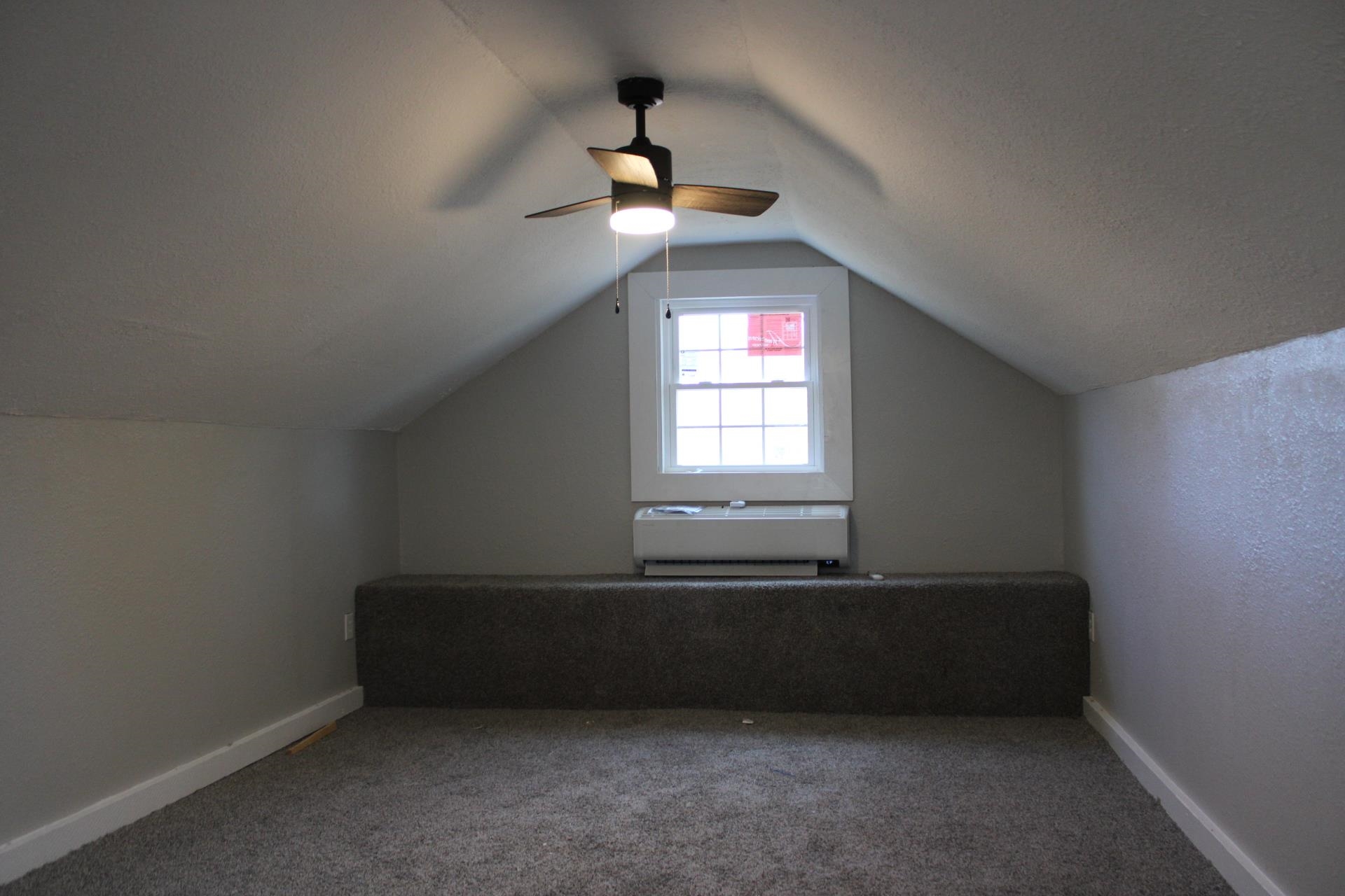 75 Curve Nankipoo Road Ripley, TN 38063 - Photo 13 of 22 an empty room with a window and a ceiling fan