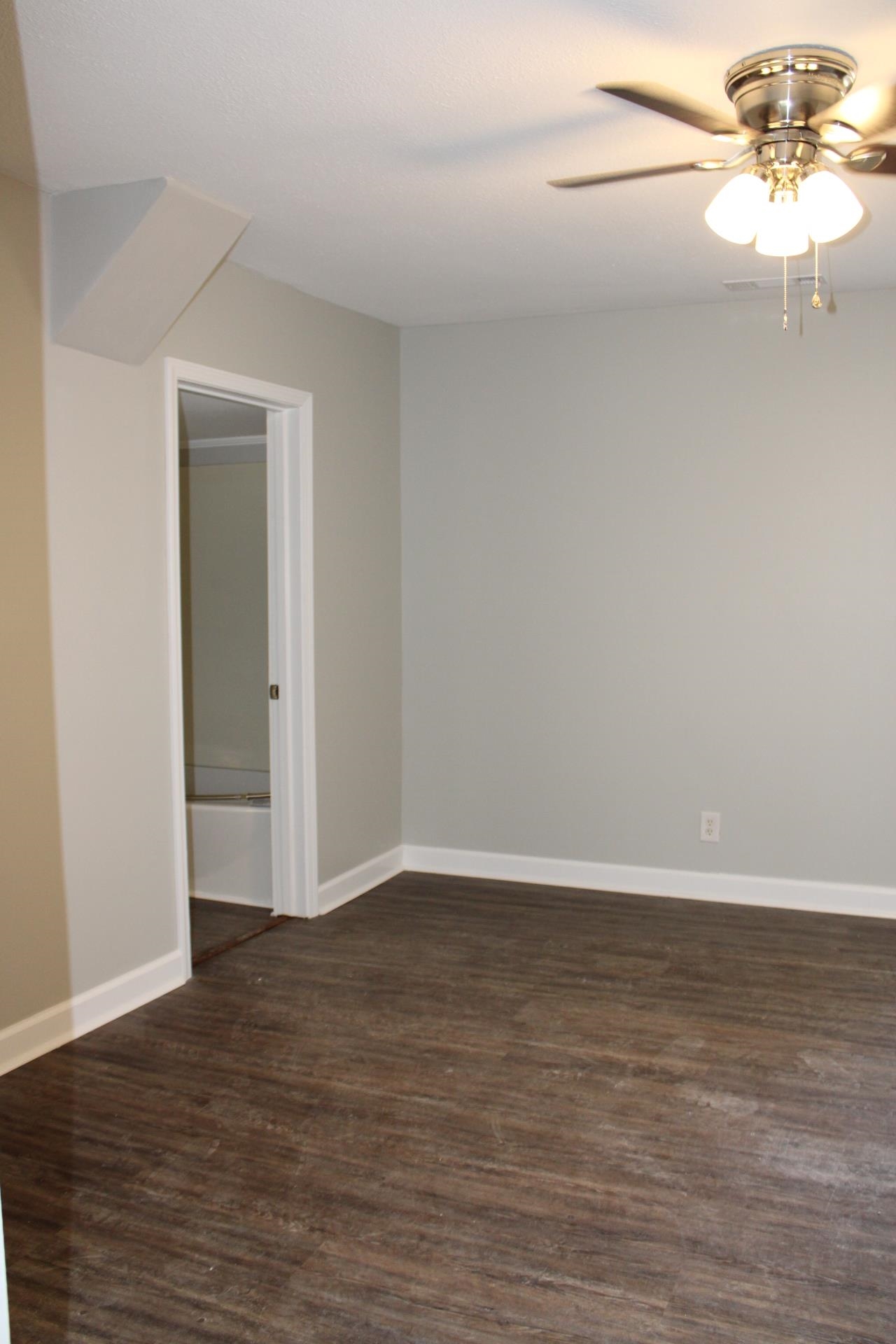 75 Curve Nankipoo Road Ripley, TN 38063 - Photo 17 of 22 a view of an empty room with wooden floor