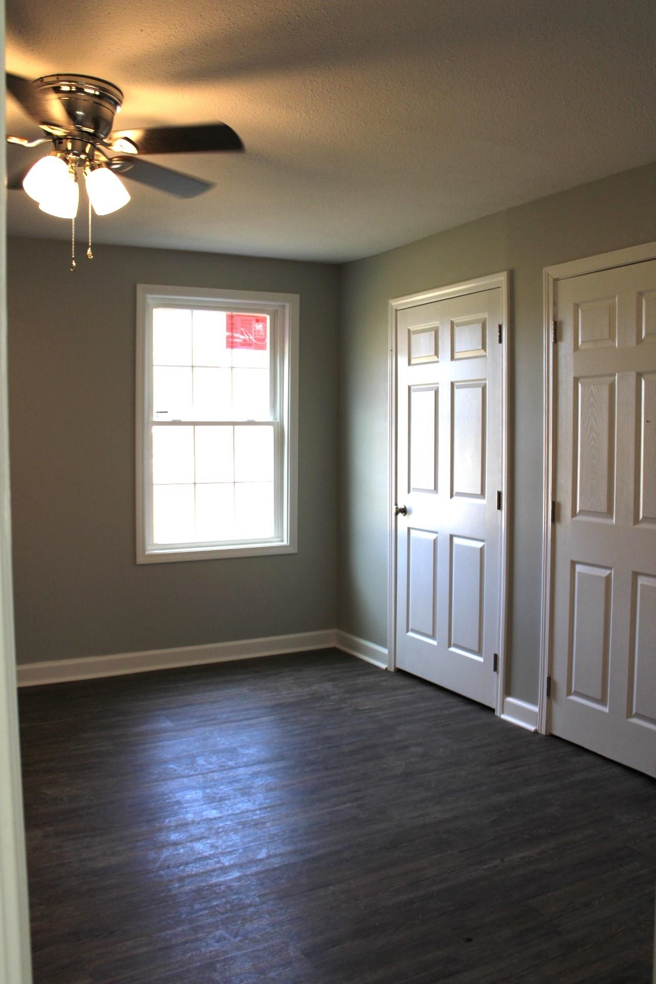 75 Curve Nankipoo Road Ripley, TN 38063 - Photo 19 of 22 a view of empty room with wooden floor and fan