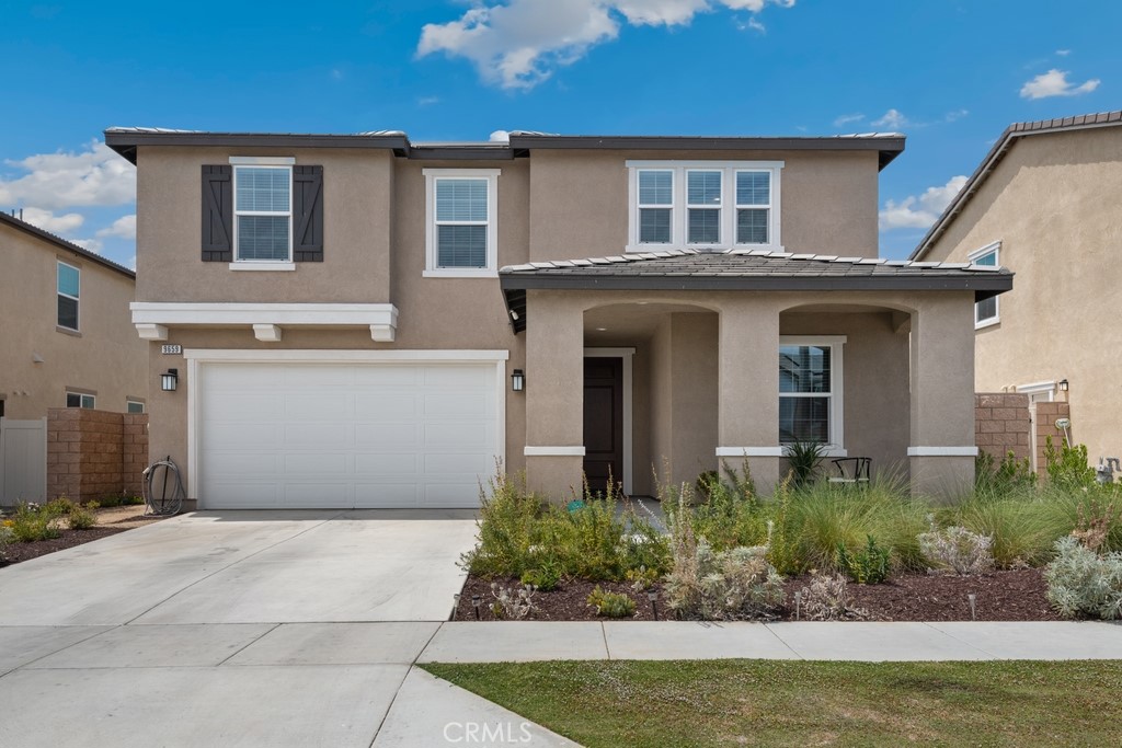 9659 Tuco Lane Riverside, CA 92508 - Photo 1 of 1 a front view of a house with a yard