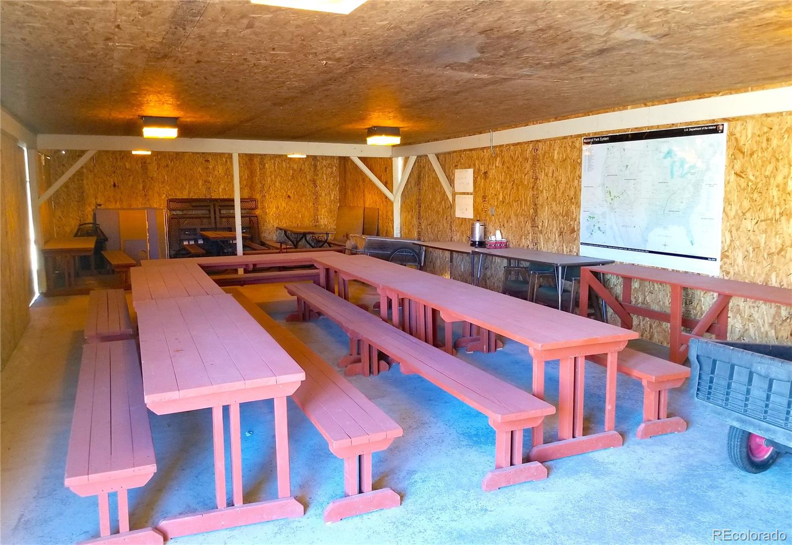 893 Rocky Mountain Road Hartsel, CO 80449 - Photo 28 of 31 a view of a chairs and table in the patio