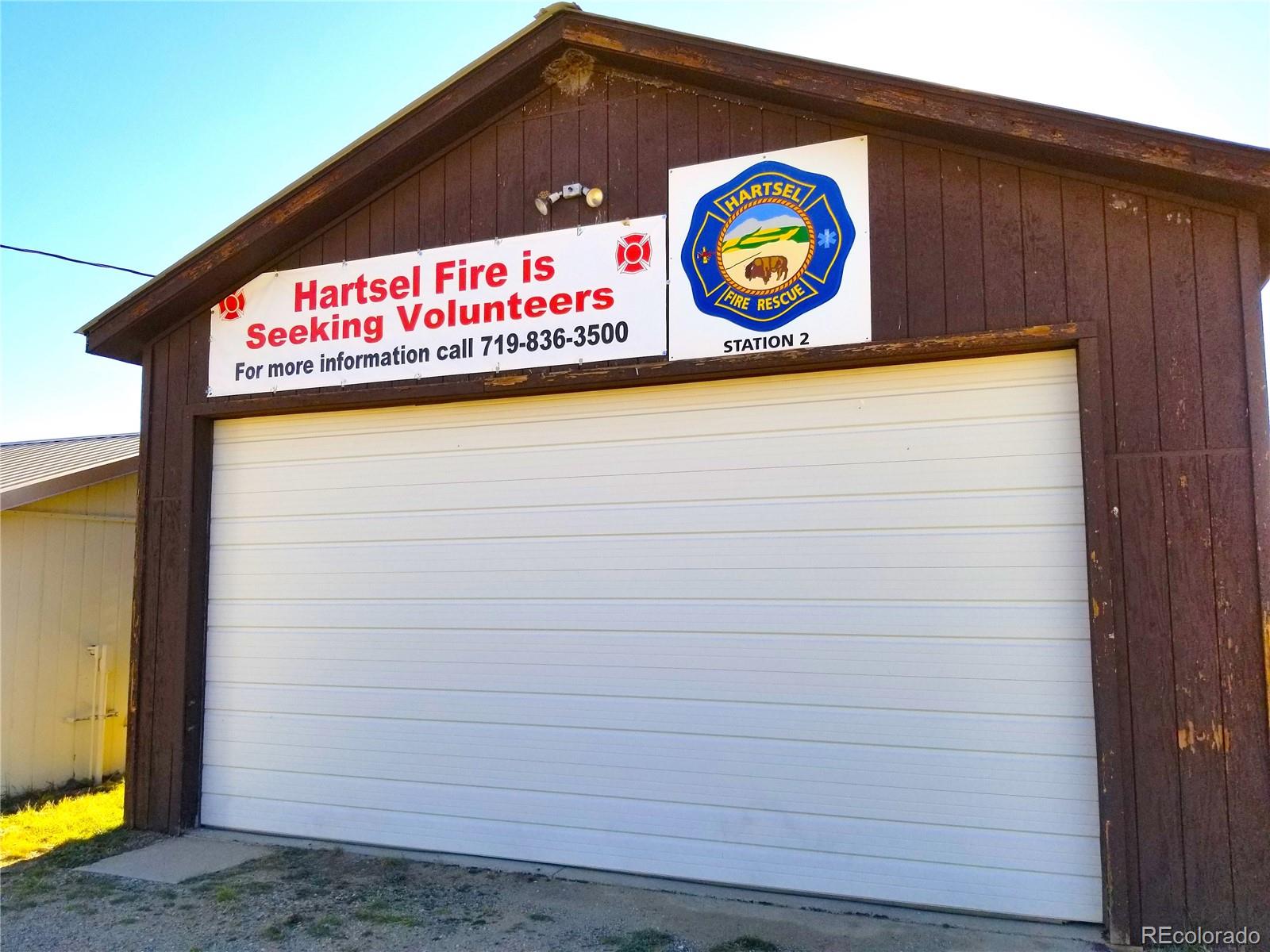 893 Rocky Mountain Road Hartsel, CO 80449 - Photo 31 of 31 a sign that is on a wooden wall