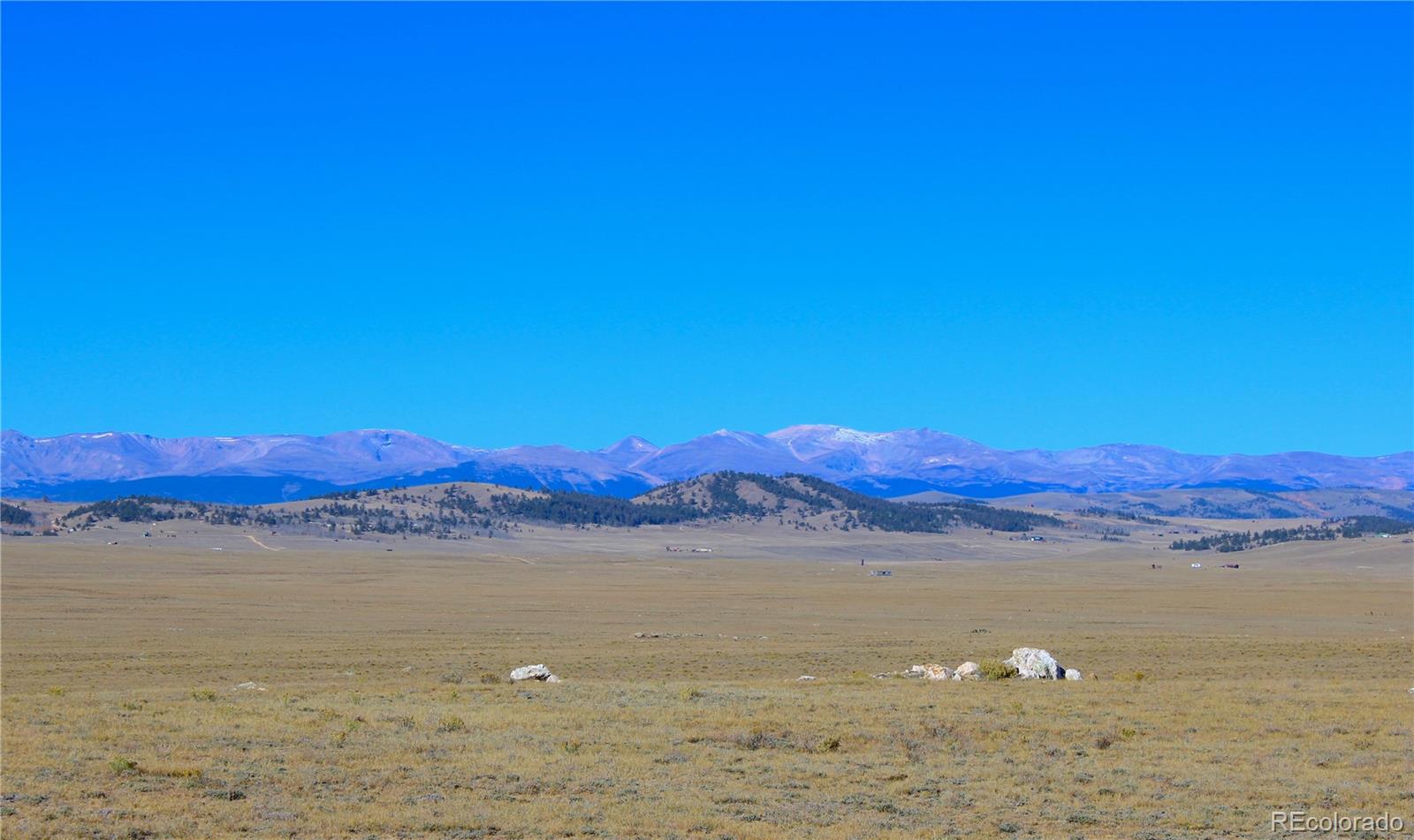 893 Rocky Mountain Road Hartsel, CO 80449 - Photo 7 of 31 a view of lake and mountain