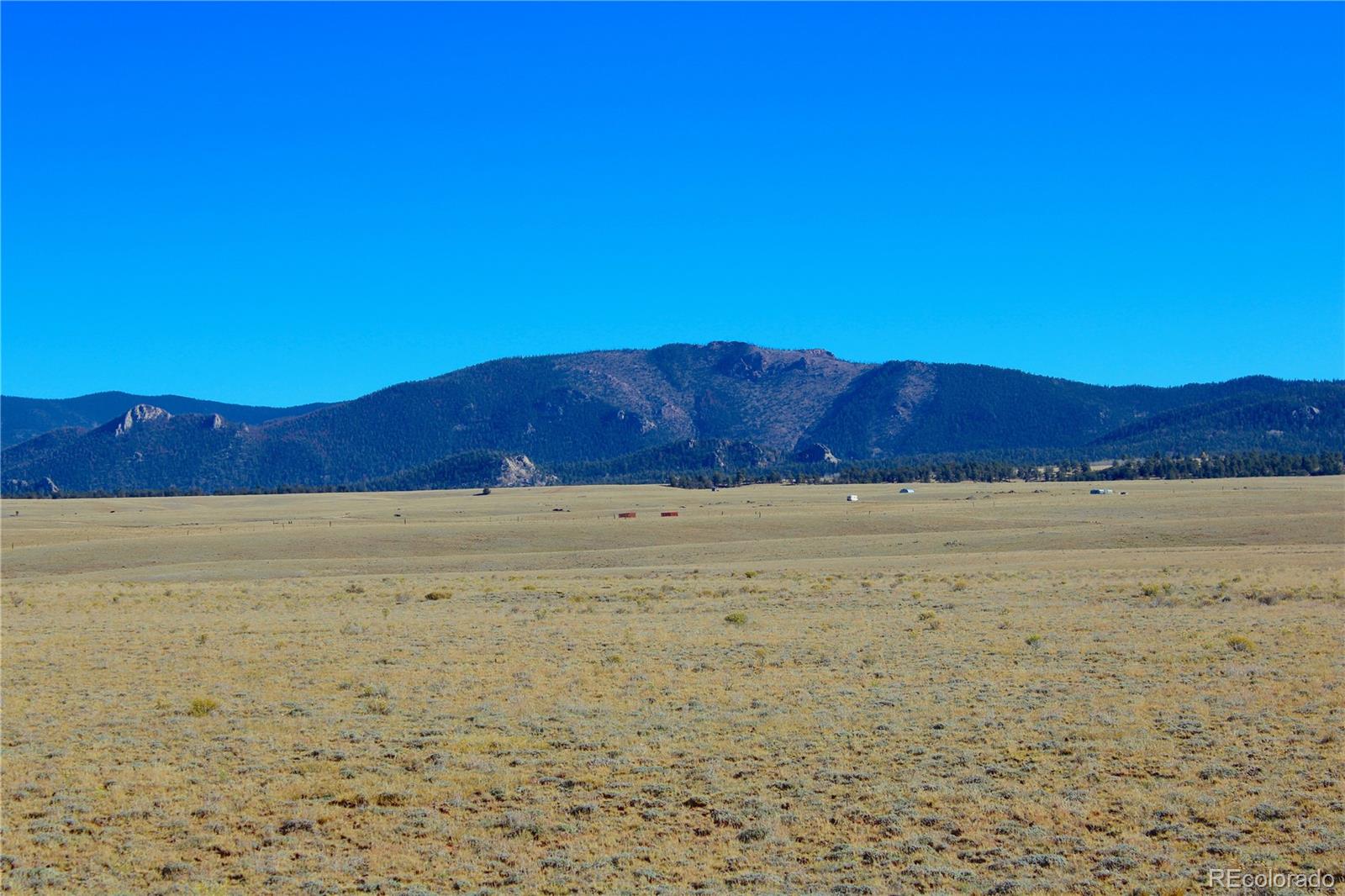 893 Rocky Mountain Road Hartsel, CO 80449 - Photo 8 of 31 a view of an ocean beach and mountain