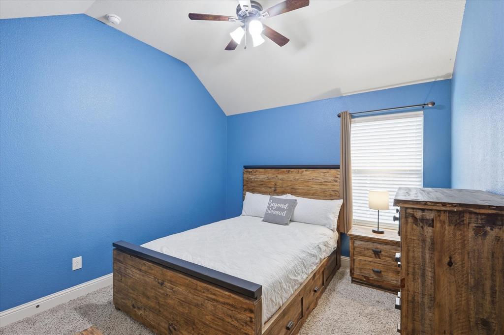 1105 Safrano Street Midlothian, TX 76065 - Photo 15 of 25 a bedroom with a bed and window