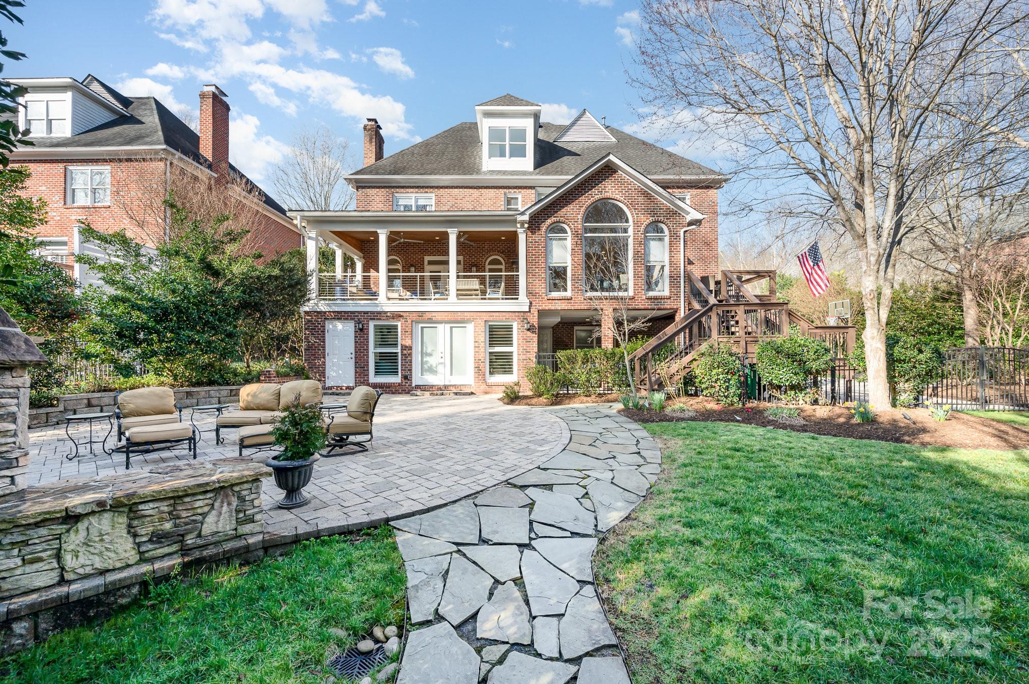 1531 Windy Ridge Road Charlotte, NC 28270 - Photo 11 of 44 a front view of a house with garden