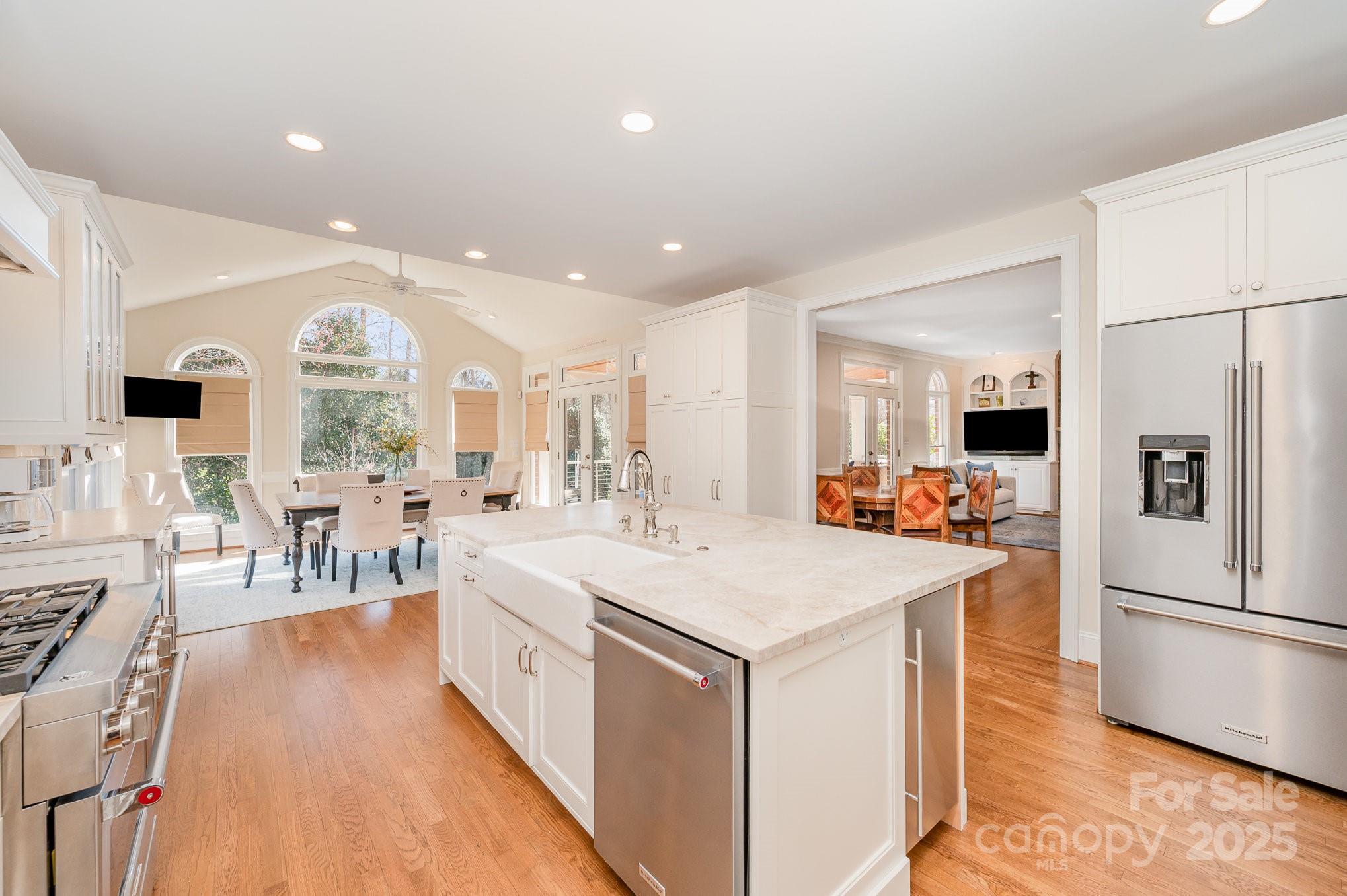 1531 Windy Ridge Road Charlotte, NC 28270 - Photo 4 of 44 a large white kitchen with a large window