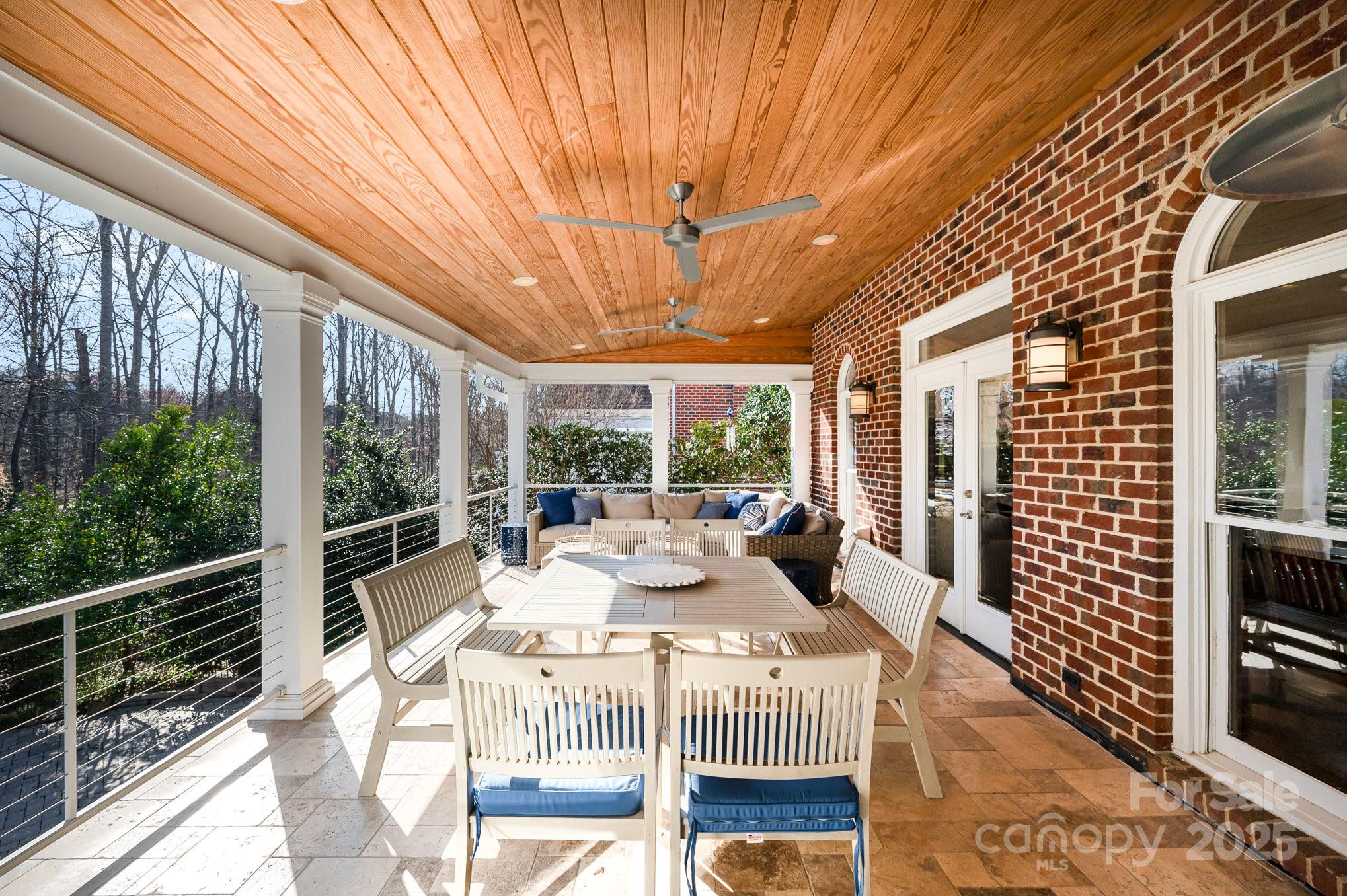 1531 Windy Ridge Road Charlotte, NC 28270 - Photo 9 of 44 a view of balcony with couch and outdoor space