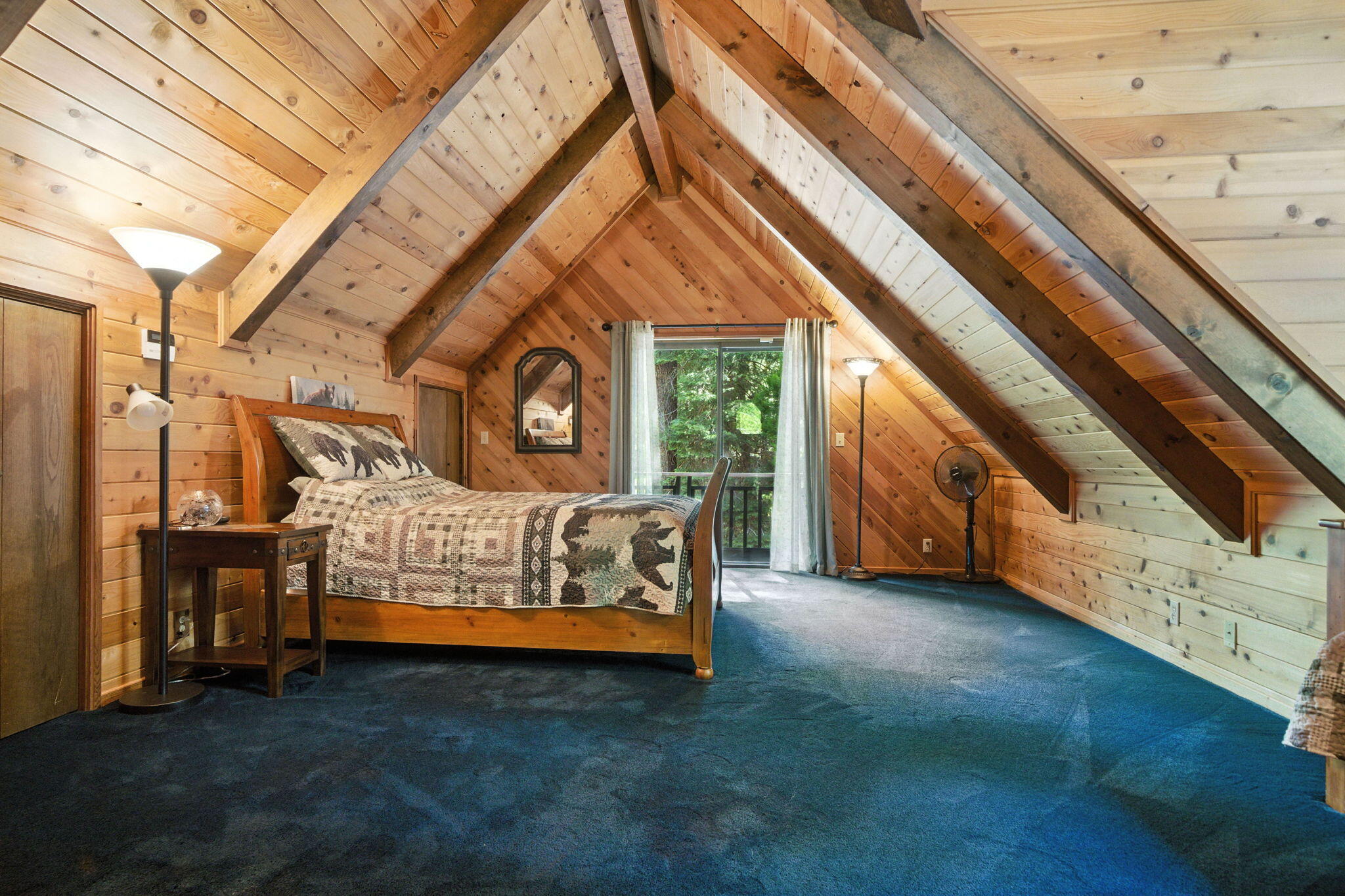 8102 Richards Lane Shingletown, CA 96088 - Photo 11 of 19 a bed sitting in a room next to a window