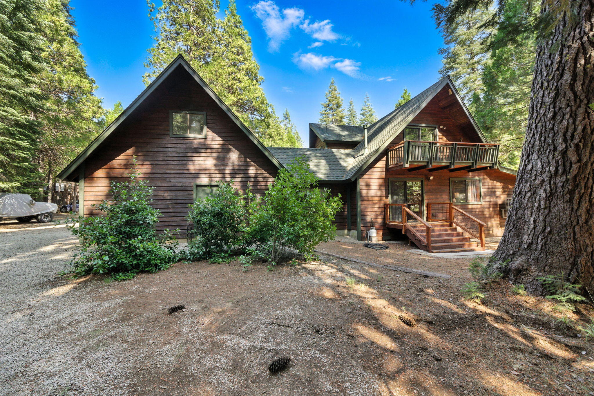 8102 Richards Lane Shingletown, CA 96088 - Photo 16 of 19 a view of a house with a yard