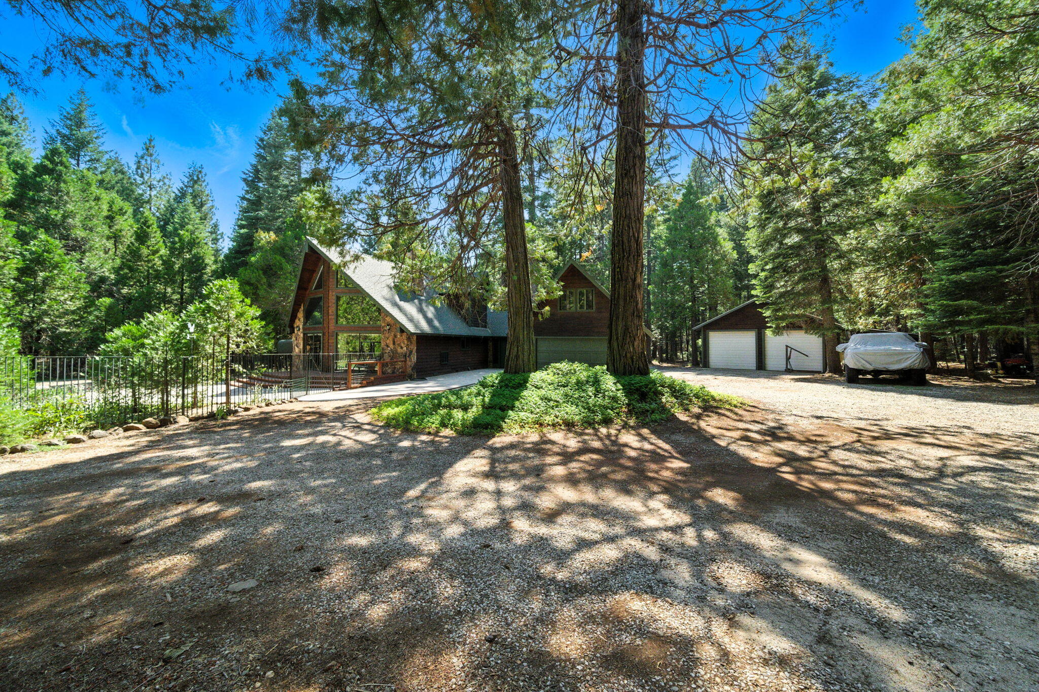 8102 Richards Lane Shingletown, CA 96088 - Photo 18 of 19 a view of a house with a yard
