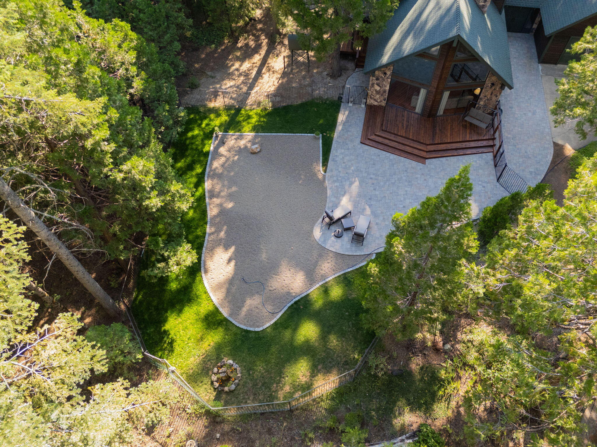 8102 Richards Lane Shingletown, CA 96088 - Photo 19 of 19 an aerial view of a house with garden space and a lake view