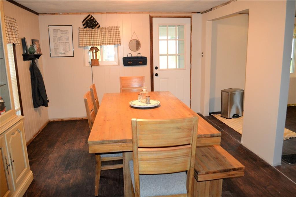 427 Freeport Road Freeport, PA 16229 - Photo 8 of 15 a room with table chairs and wooden floor
