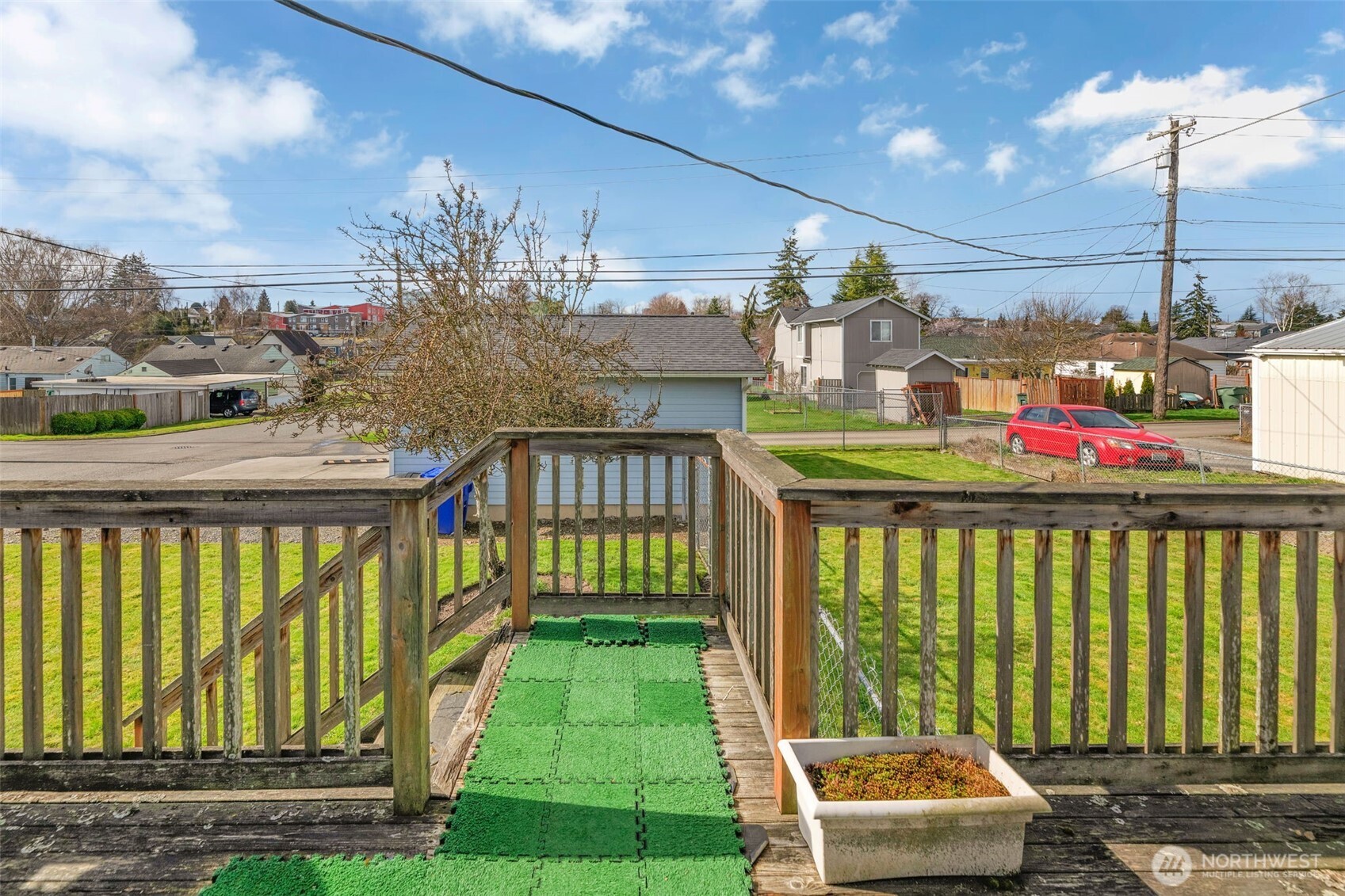 1332 East Marine View Drive Everett, WA 98201 - Photo 17 of 26 a front view of a house with a garden