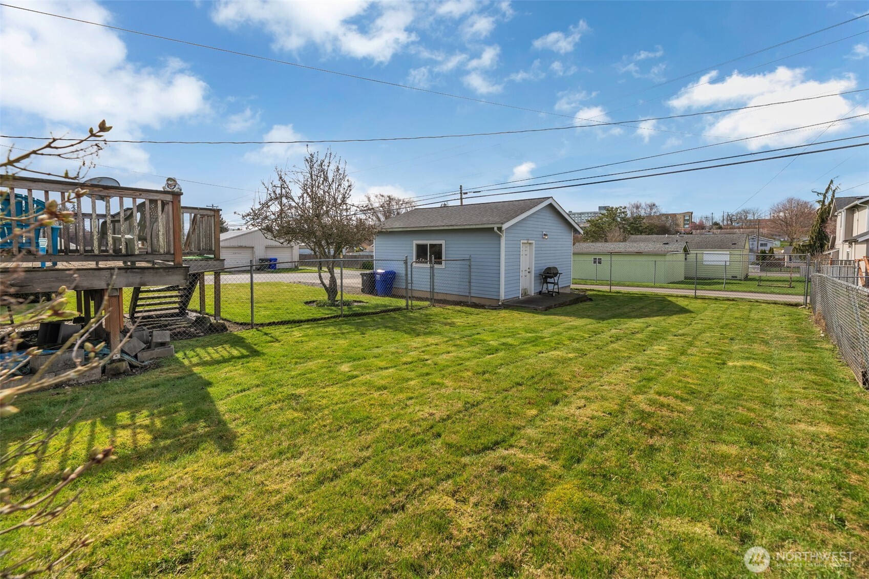 1332 East Marine View Drive Everett, WA 98201 - Photo 18 of 26 a swimming pool with outdoor seating and yard