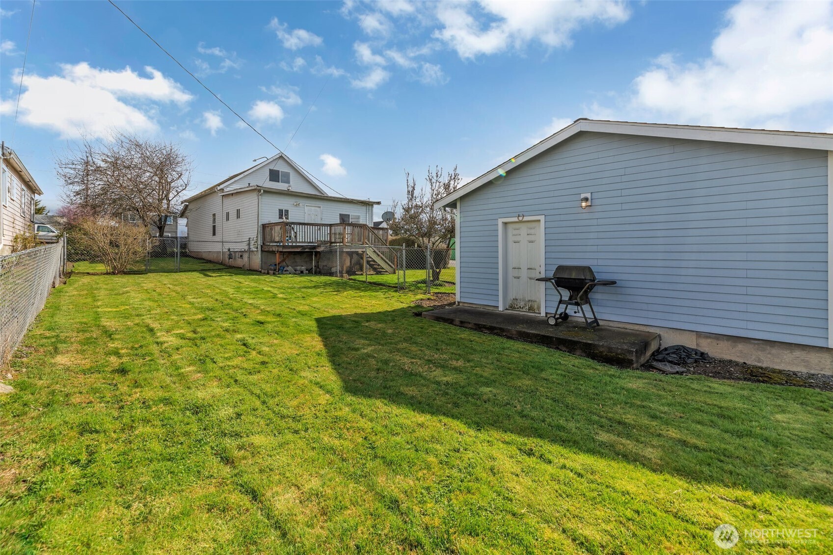1332 East Marine View Drive Everett, WA 98201 - Photo 19 of 26 a front view of a house with a yard