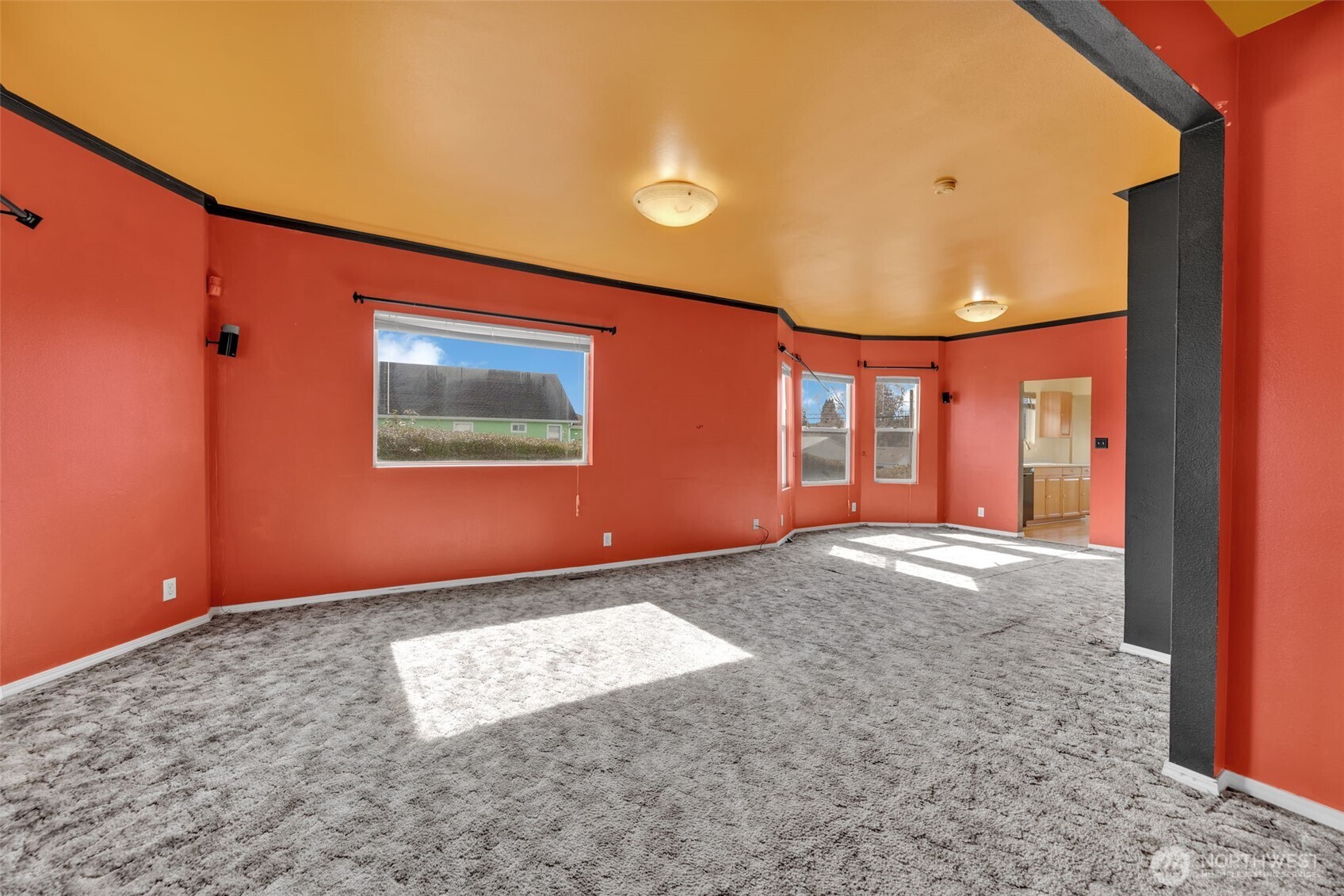 1332 East Marine View Drive Everett, WA 98201 - Photo 2 of 26 a view of an empty room with window and stairs