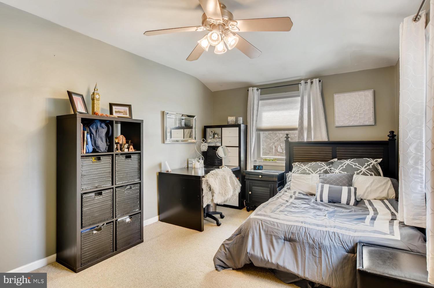 6803 Barnett Road Baltimore, MD 21239 - Photo 20 of 28 FRONT BEDROOM WITH CARPET AND CEILING FAN