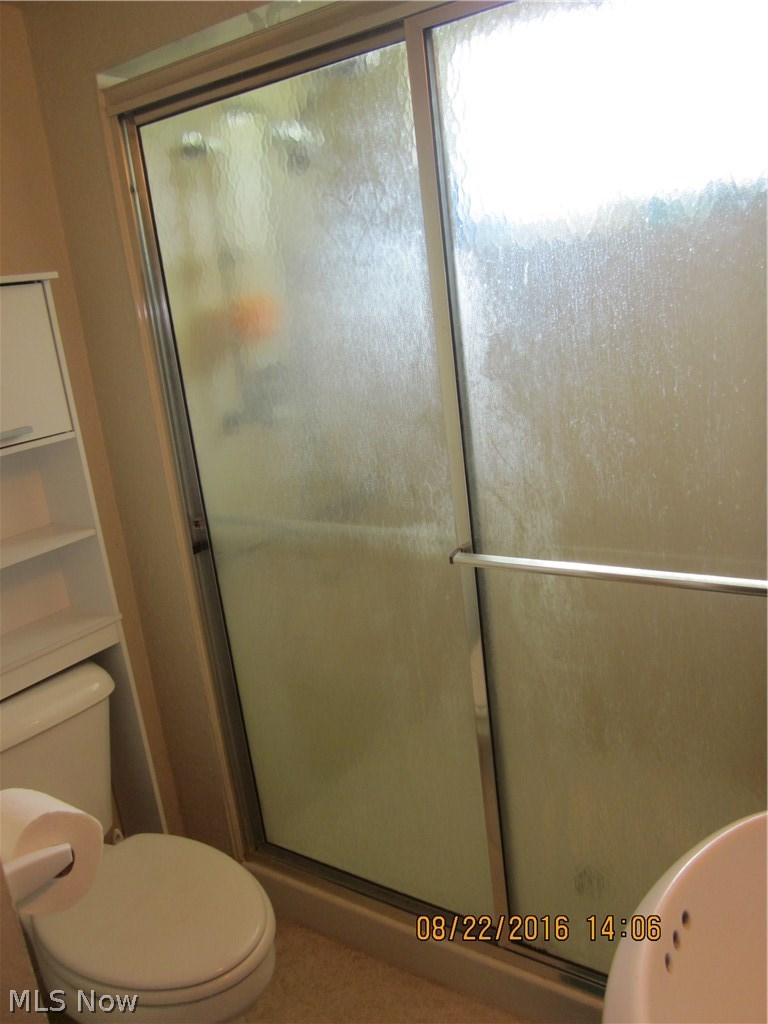 638 Substation Road Brunswick, OH 44212 - Photo 9 of 16 Full bath includes walk-in double shower.