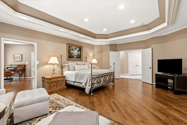 a bedroom with a bed and furniture
