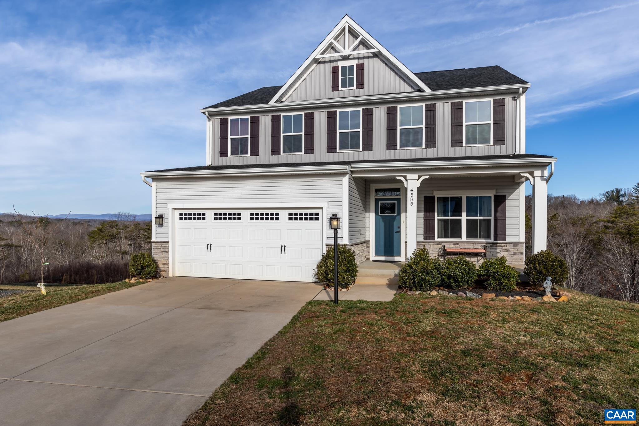 4585 Sunset Drive Charlottesville, VA 22911 - Photo 14 of 70 a front view of a house with garden