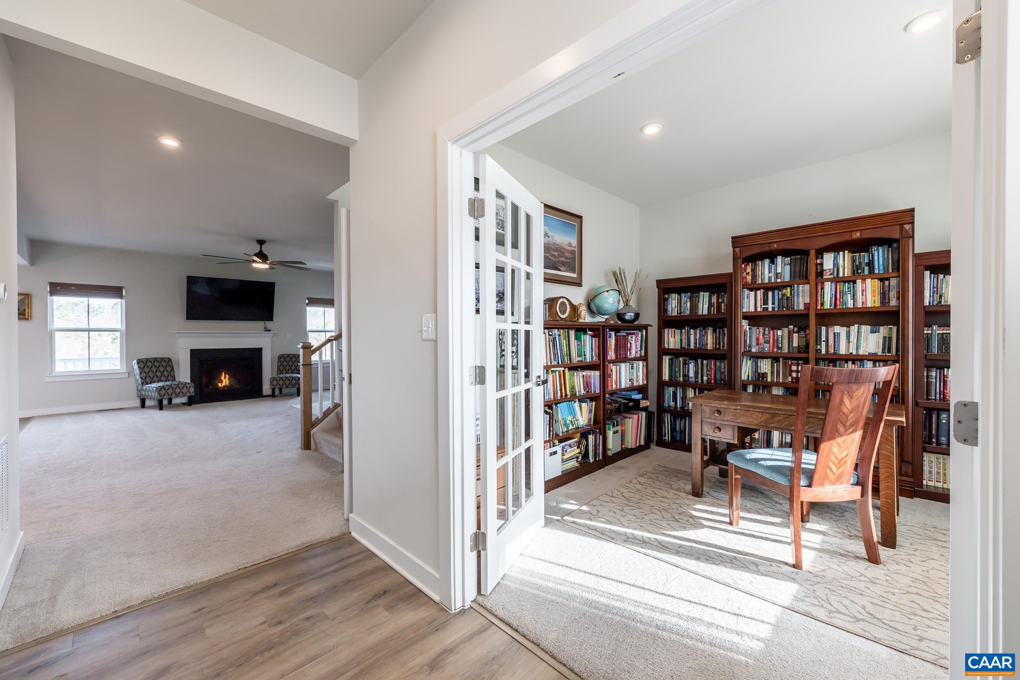 4585 Sunset Drive Charlottesville, VA 22911 - Photo 17 of 70 a view of a livingroom with furniture and a bookshelf