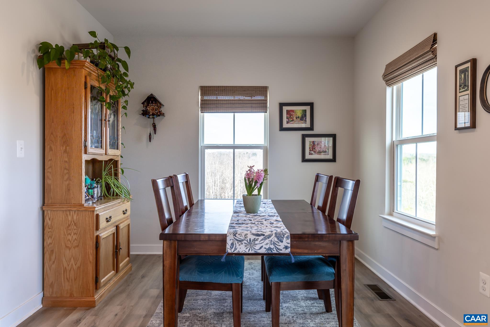 4585 Sunset Drive Charlottesville, VA 22911 - Photo 26 of 70 a view of a dining room with furniture and window