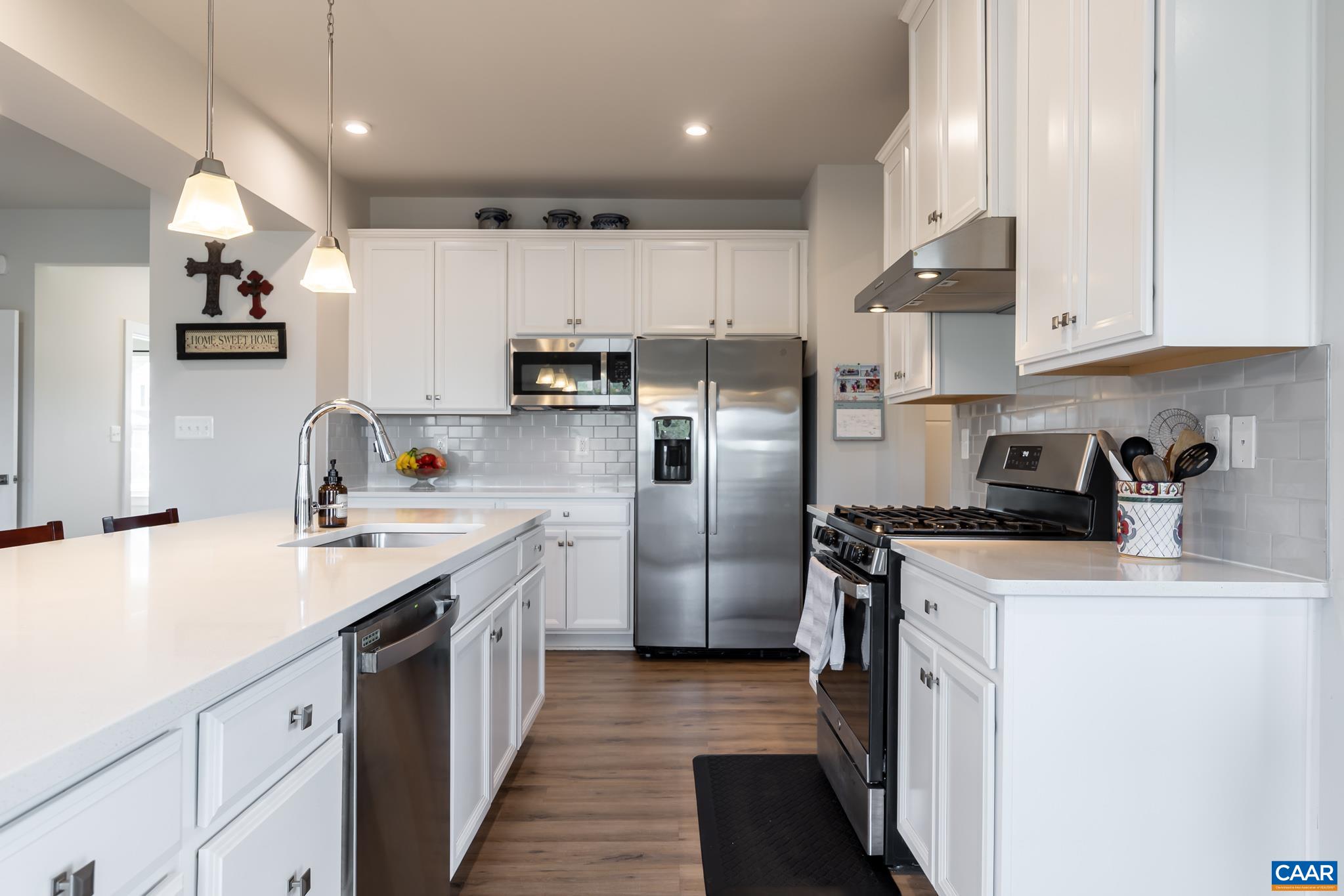 4585 Sunset Drive Charlottesville, VA 22911 - Photo 28 of 70 a kitchen with stainless steel appliances granite countertop a sink a stove a refrigerator and cabinets