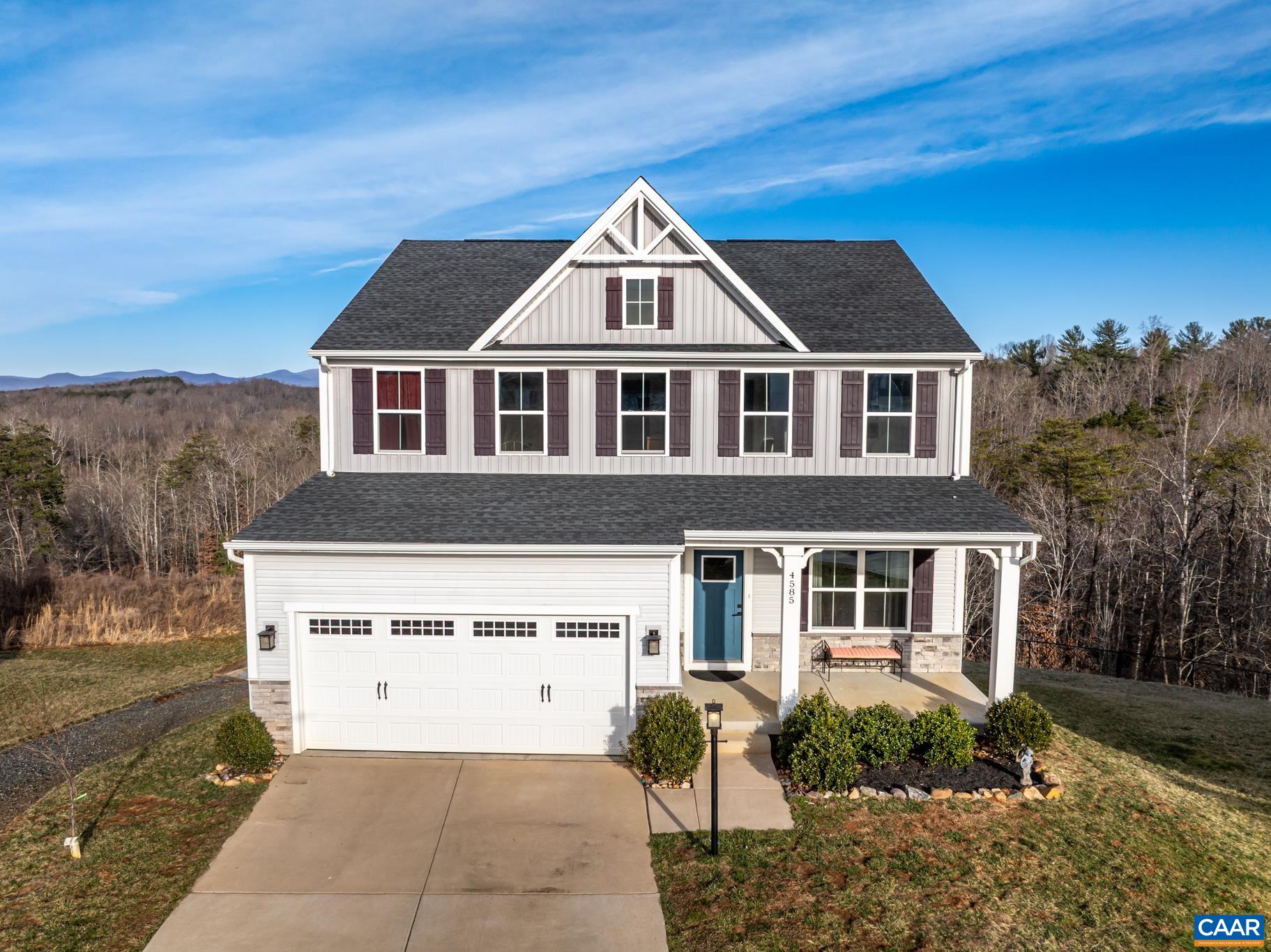 4585 Sunset Drive Charlottesville, VA 22911 - Photo 3 of 70 a front view of a house with a yard