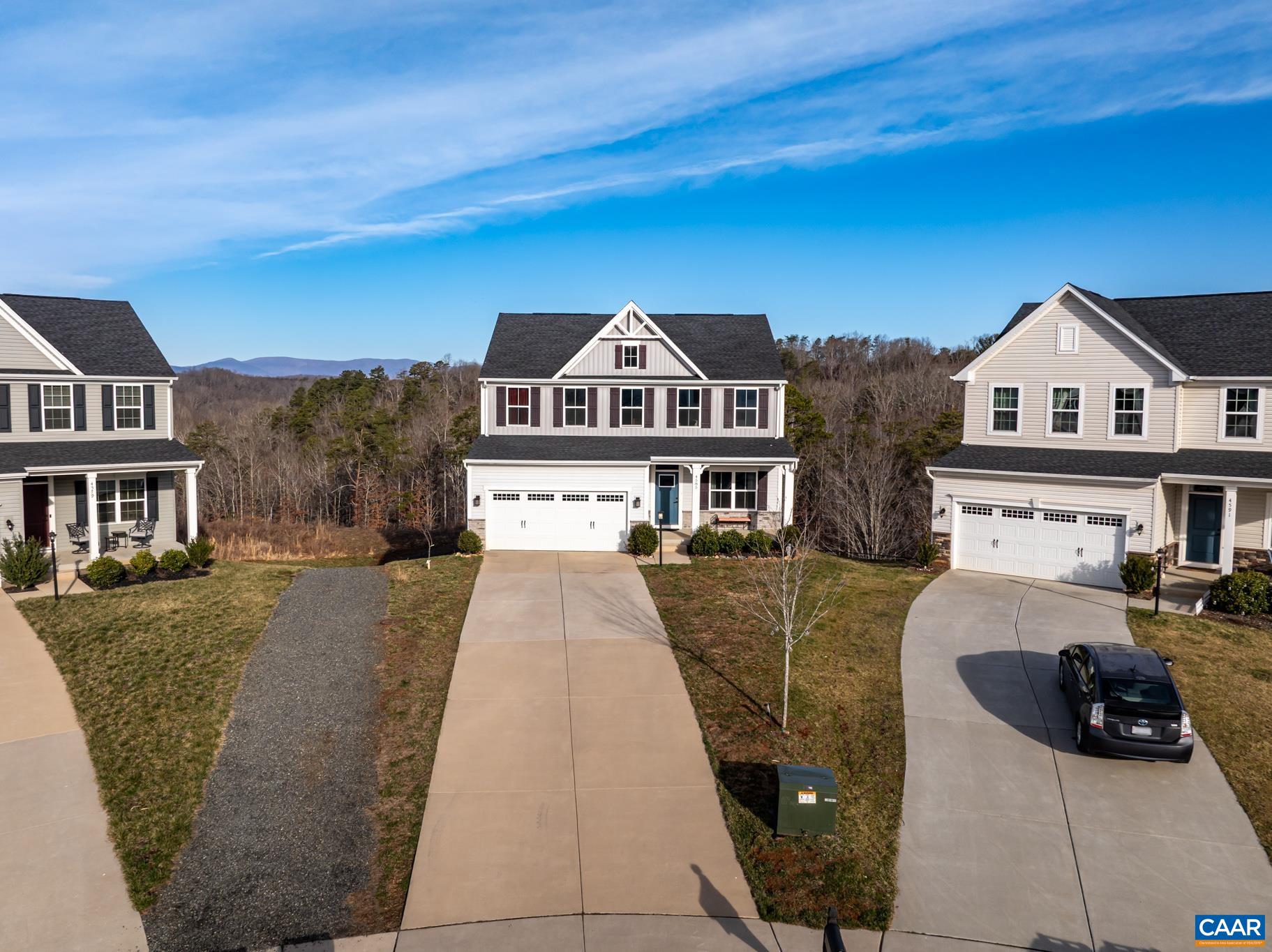 4585 Sunset Drive Charlottesville, VA 22911 - Photo 5 of 70 a front view of a house with a yard