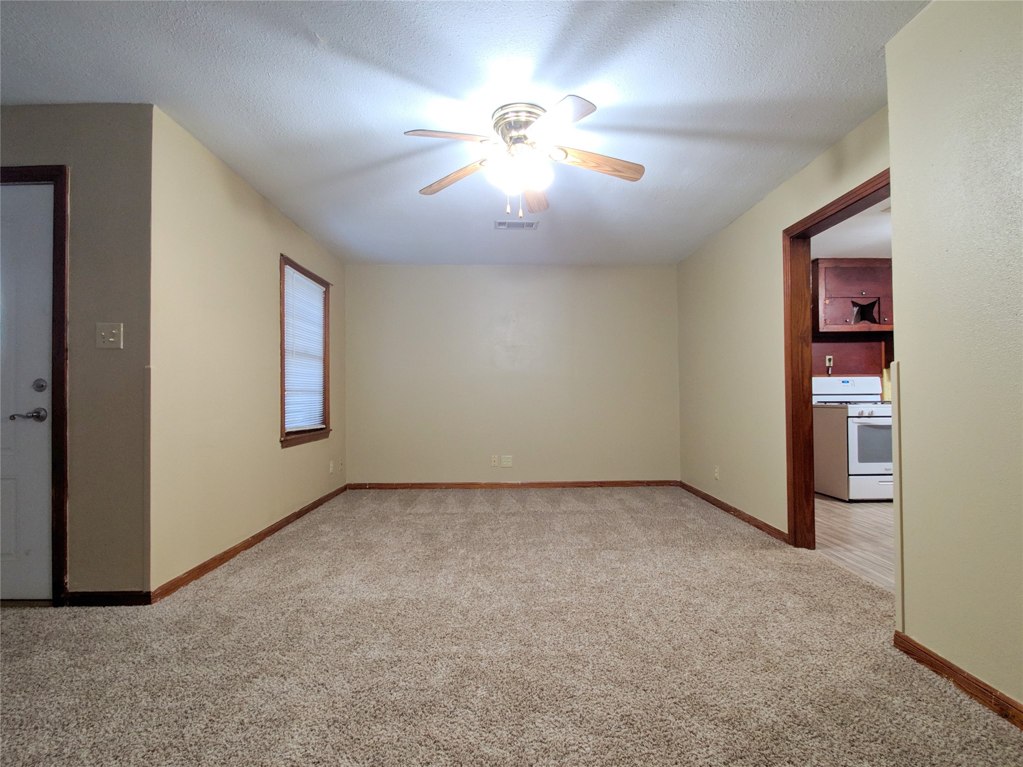 1717 Hawthorne Street La Marque, TX 77568 - Photo 4 of 11 a view of an empty room with a window