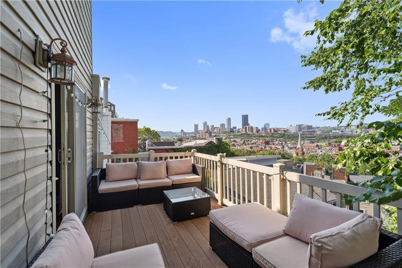 167 Pius Street Pittsburgh, PA 15203 - Photo 33 of 49 a view of a balcony with a couch