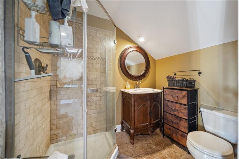 167 Pius Street Pittsburgh, PA 15203 - Photo 36 of 49 a bathroom with a toilet a sink and a shower