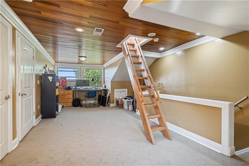 167 Pius Street Pittsburgh, PA 15203 - Photo 39 of 49 a view of a hallway with stairs