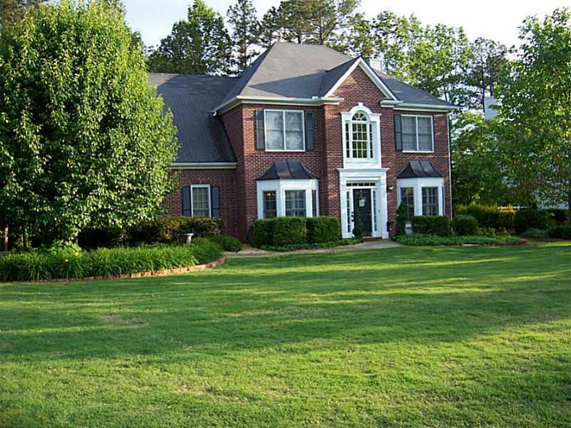 7010 Silver Fox Trail Cumming, GA 30040 - Photo 1 of 1 Exterior Front. Lovely traditional home on level lot situated between two cul de sacs. Great front yard, private back yard.