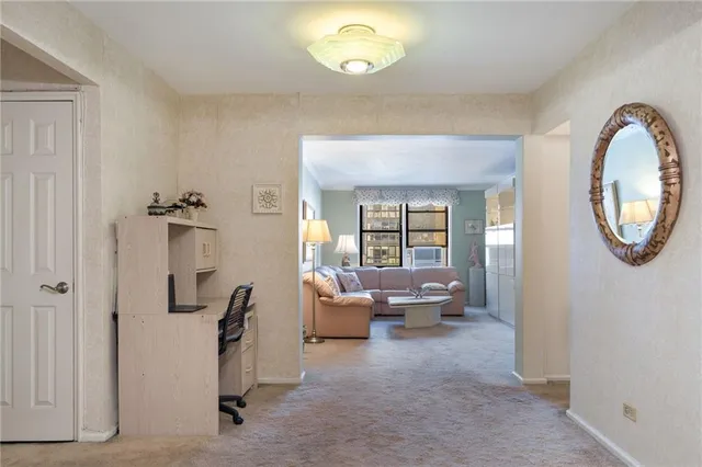 a view of living room and kitchen