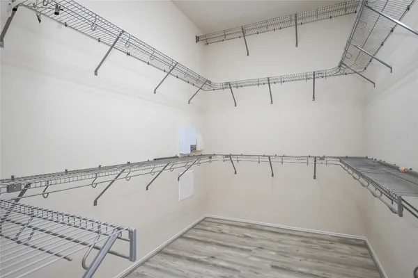 a view of a room with racks on the wall