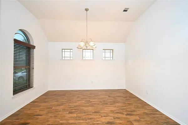 a view of a room with a large window