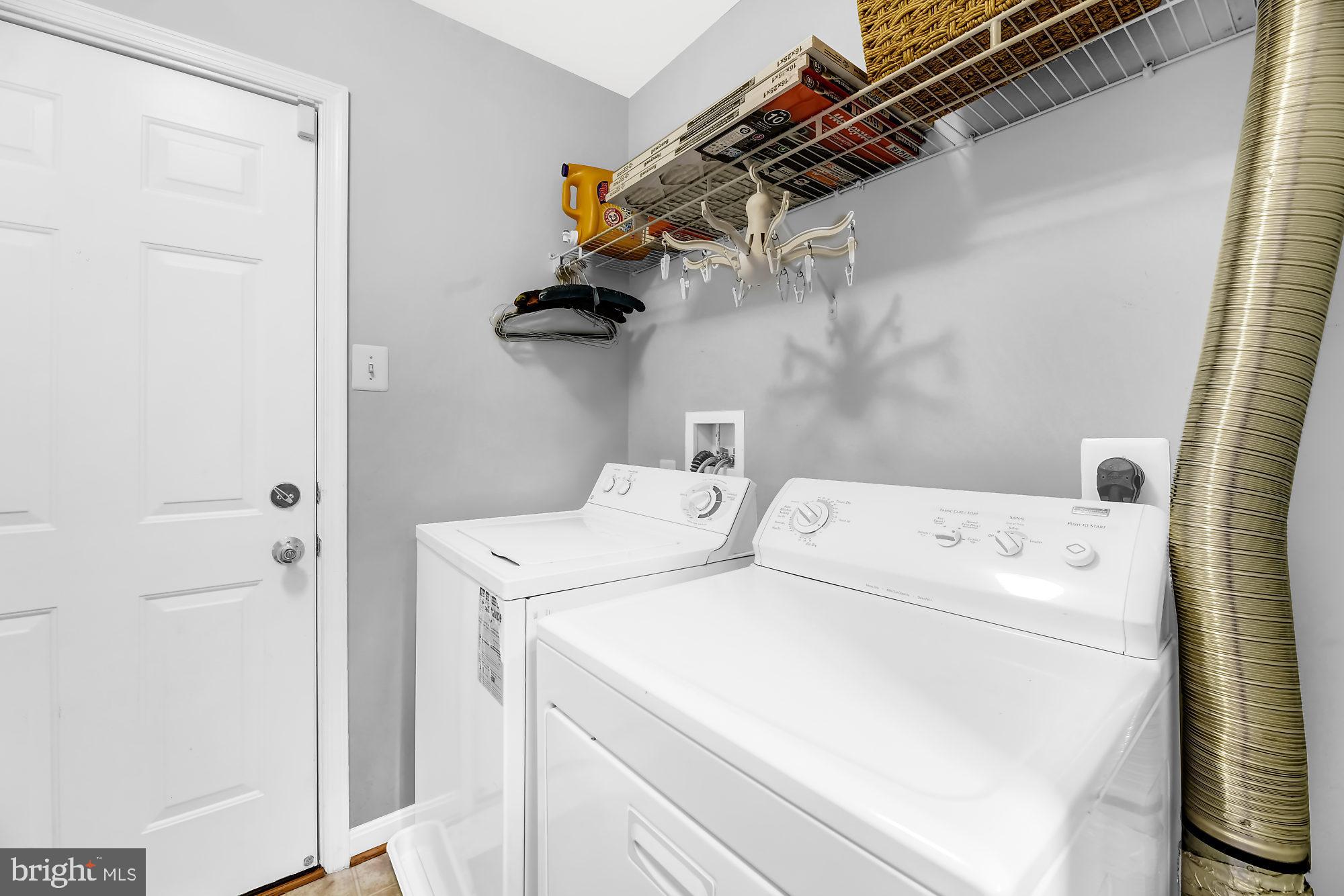 2090 Clipper Park Road Baltimore, MD 21211 - Photo 33 of 75 a utility room with dryer and washer