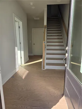 a view of a livingroom with a staircase