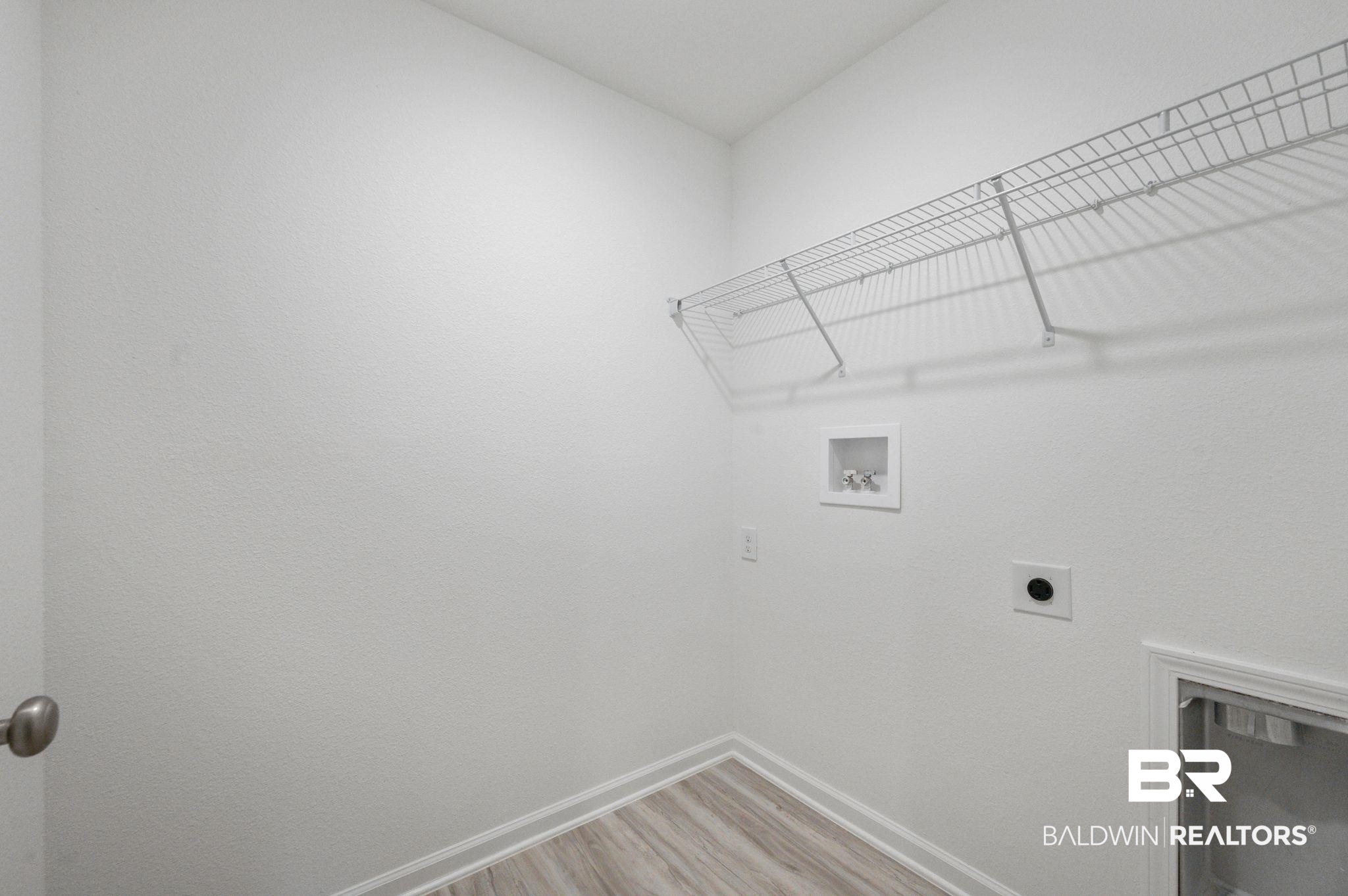 16272 Laurelbrooke Loop Fairhope, AL 36532 - Photo 15 of 40 Washroom with electric dryer hookup, hookup for a washing machine, and hardwood / wood-style flooring