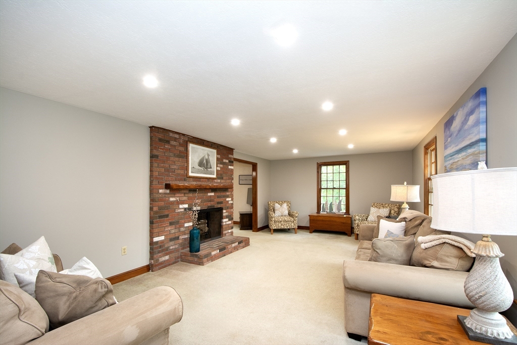 26 Old Coach Road Cohasset, MA 02025 - Photo 12 of 33 a living room with furniture and a couch