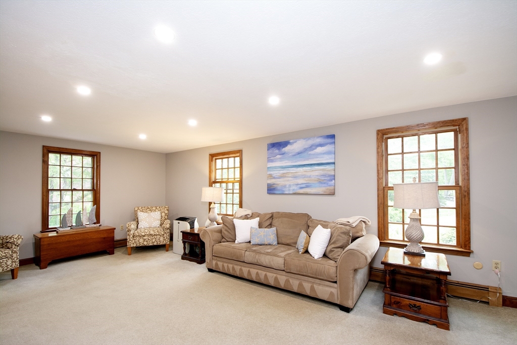 26 Old Coach Road Cohasset, MA 02025 - Photo 13 of 33 a living room with furniture and a window
