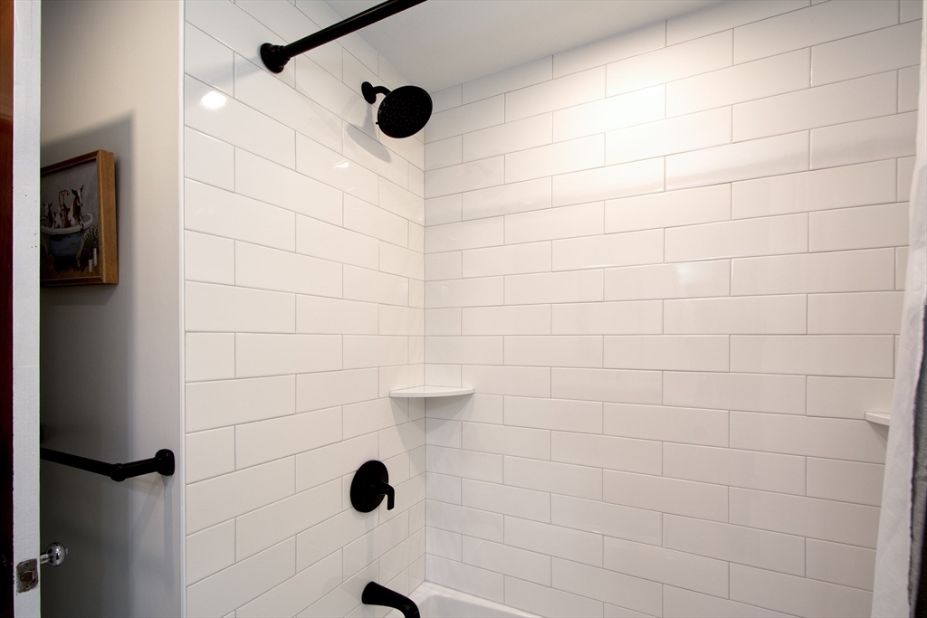 26 Old Coach Road Cohasset, MA 02025 - Photo 24 of 33 a bathroom with a shower