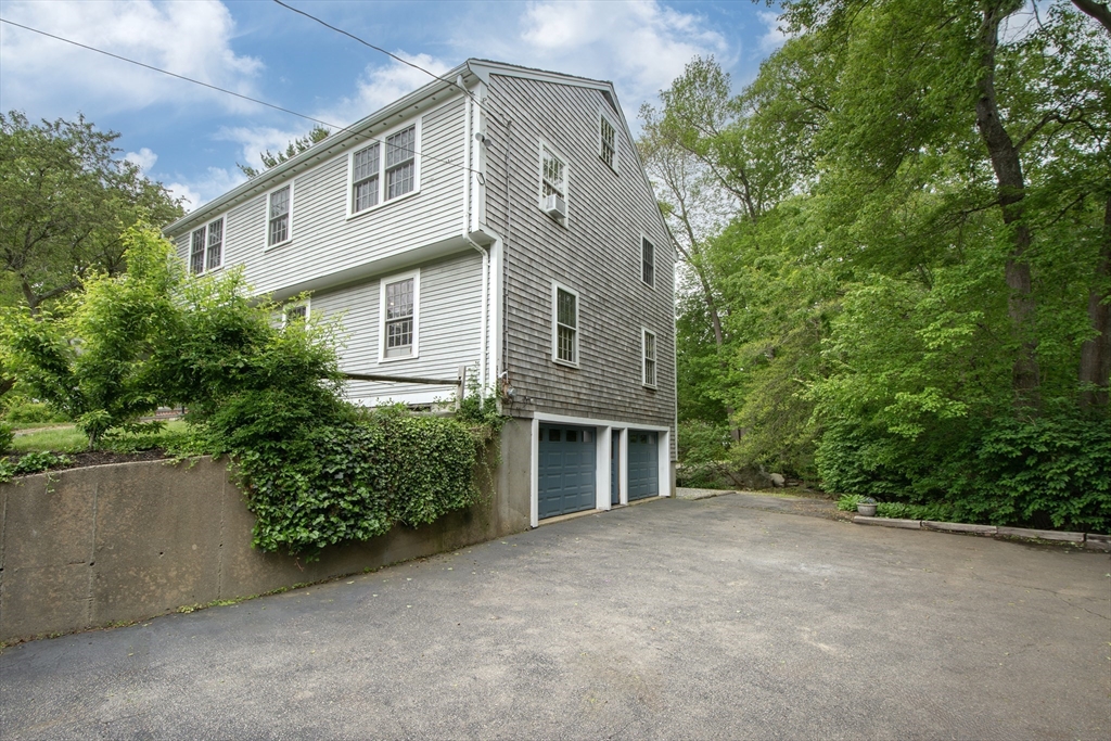 26 Old Coach Road Cohasset, MA 02025 - Photo 33 of 33 front view of a house with a yard
