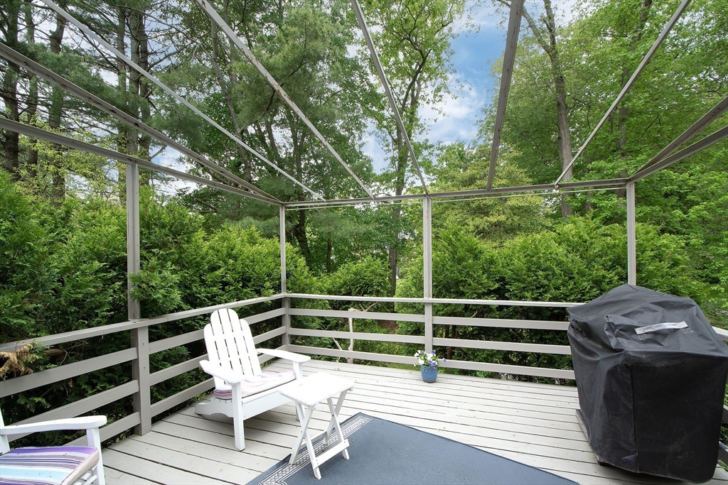 26 Old Coach Road Cohasset, MA 02025 - Photo 6 of 33 a view of a chairs and table on the wooden floor